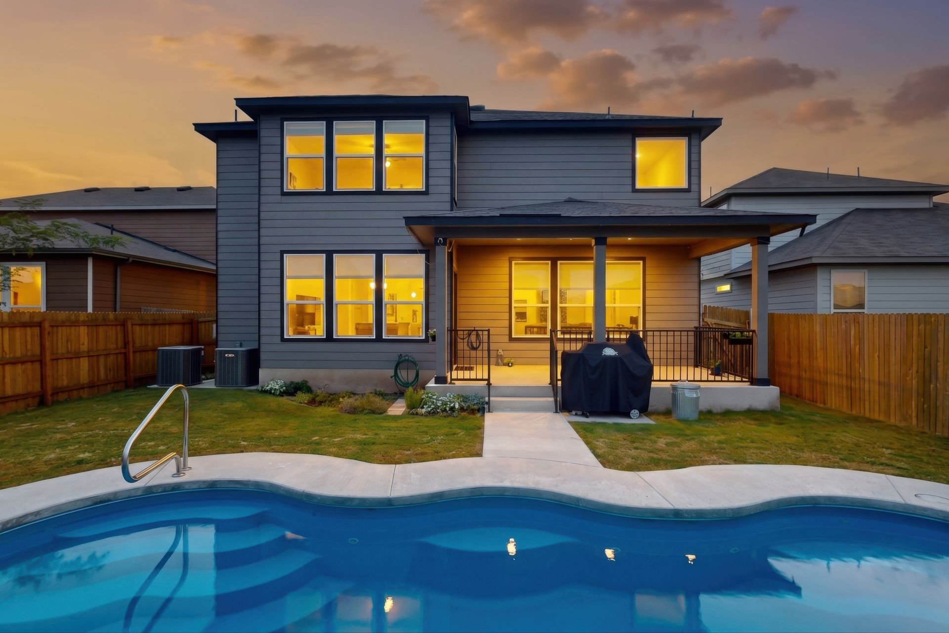 Saltwater pool at twilight behind 2704 Nueva Cordova in Seguin, Texas